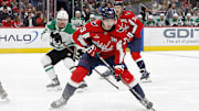 Oct 17, 2024; Washington, District of Columbia, USA; Washington Capitals center Hendrix Lapierre (29) skates with the puck as Dallas Stars center Sam Steel (18) chases in the first period at Capital One Arena. Mandatory Credit: Geoff Burke-Imagn Images