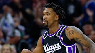 Nov 11, 2025; Sacramento, California, USA; Sacramento Kings guard Malik Monk (0) celebrates after scoring a basket during the first quarter against the Denver Nuggets at Golden 1 Center.