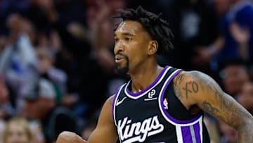 Nov 11, 2025; Sacramento, California, USA; Sacramento Kings guard Malik Monk (0) celebrates after scoring a basket during the first quarter against the Denver Nuggets at Golden 1 Center.