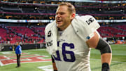 Nov 5, 2023; Atlanta, Georgia, USA; Minnesota Vikings center Garrett Bradbury (56) runs off the field after a victory against the Atlanta Falcons at Mercedes-Benz Stadium.