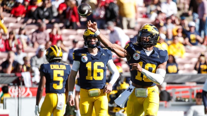 Michigan quarterback Alex Orji (10) warms up ahead of the Rose Bowl game against Alabama at Rose Bowl Stadium in Pasadena, Calif., on Monday, Jan. 1, 2024.