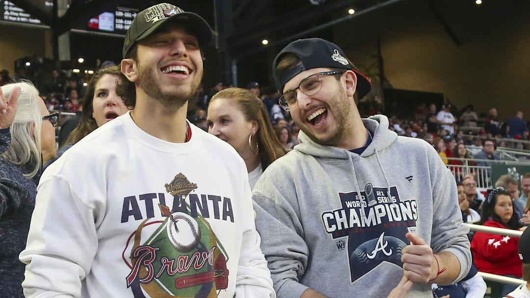 Atlanta Braves fans react before the game on Opening Day against the Cincinnati Reds at Truist Park.
