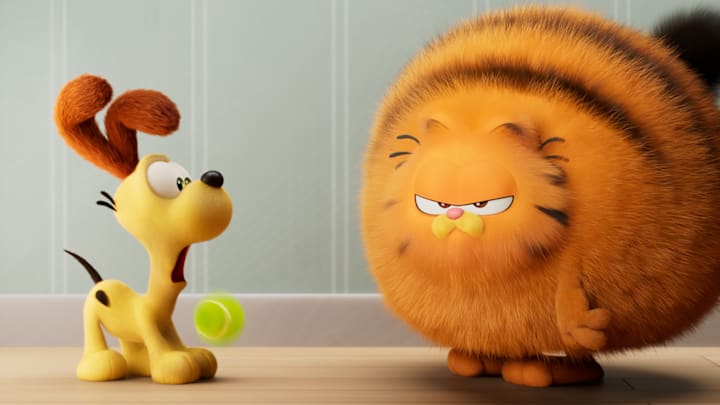 Odie and Garfield (voiced by Chris Pratt) in THE GARFIELD MOVIE. © 2023 Project G Productions, LLC