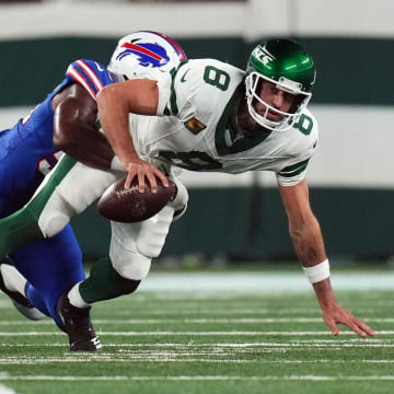 Buffalo Bills defensive end Leonard Floyd (56) sacks New York Jets quarterback Aaron Rodgers (8) early in the first quarter during the home opener at MetLife Stadium on Monday, Sept. 11, 2023, in East Rutherford. Rodgers was carted off the field after being hit.