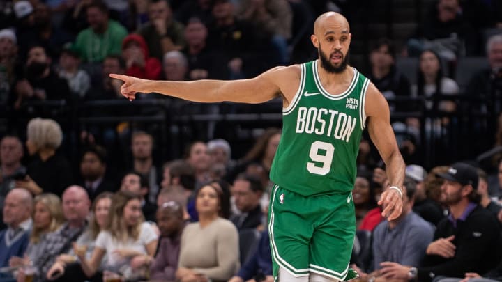 Dec 20, 2023; Sacramento, California, USA; Boston Celtics guard Derrick White (9) points to a team mate after scoring a three point shot during the fourth quarter at Golden 1 Center. Mandatory Credit: Ed Szczepanski-USA TODAY Sports