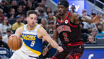 Nov 29, 2025; Indianapolis, Indiana, USA; Indiana Pacers guard T.J. McConnell (9) drives with the ball against Chicago Bulls forward Emanuel Miller (2) during the second half at Gainbridge Fieldhouse. Mandatory Credit: Trevor Ruszkowski-Imagn Images