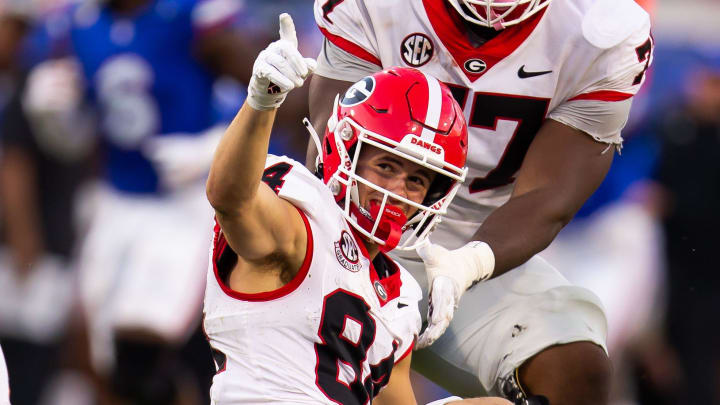 Georgia Bulldogs wide receiver Ladd McConkey (84) signals a first down after hauling in a pass.