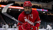 Wisconsin men's hockey goes all red while defeating No. 1 Michigan State on the Spartans' home rink on Nov. 20. 2025.