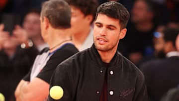 Carlos Alcaraz at an NBA game