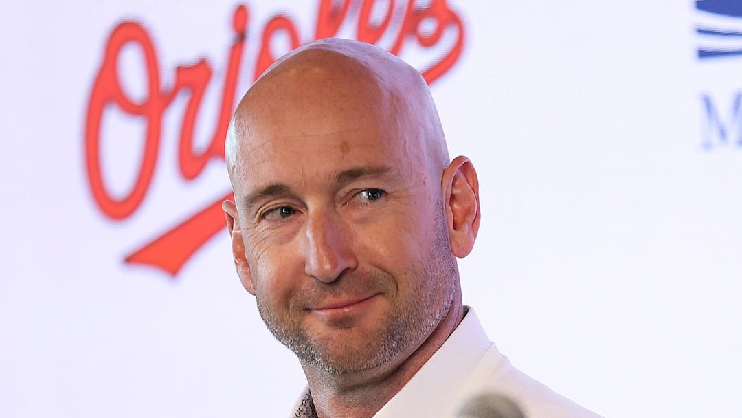 Nov 4, 2025; Baltimore, MD, USA; Left: Craig Albernaz looks at Right: President of Baseball Operations Mike Elias after being introduced as the Baltimore Orioles new Manager at Warehouse Bar. Mandatory Credit: Daniel Kucin Jr.-Imagn Images
