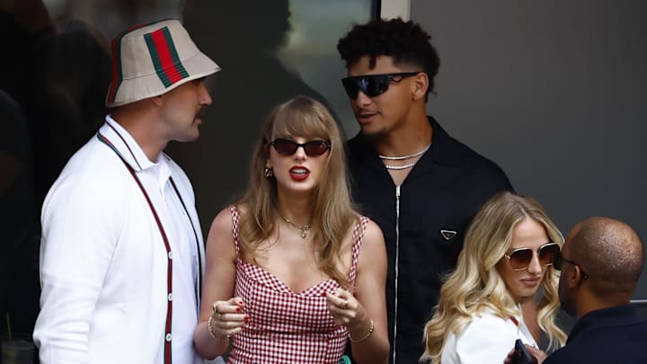 Taylor Swift, center, possibly reacts to learning Travis Kelce, left, was only a two-star recruit out of high school, while Patrick Mahomes, right, was only a three-star.