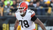 Dec 8, 2024; Pittsburgh, Pennsylvania, USA;  Cleveland Browns offensive tackle Jack Conklin (78) blocks at the line of scrimmage against the Pittsburgh Steelers during the fourth quarter at Acrisure Stadium. Mandatory Credit: Charles LeClaire-Imagn Images
