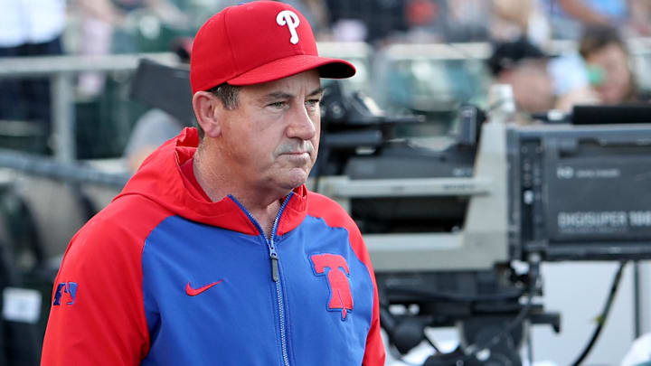 Philadelphia Phillies manager Rob Thomson (59) in the dugout before the start of the game against the Athletics at Sutter Health Park.