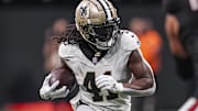 Sep 29, 2024; Atlanta, Georgia, USA; New Orleans Saints running back Alvin Kamara (41) runs against the Atlanta Falcons at Mercedes-Benz Stadium. Mandatory Credit: Dale Zanine-Imagn Images