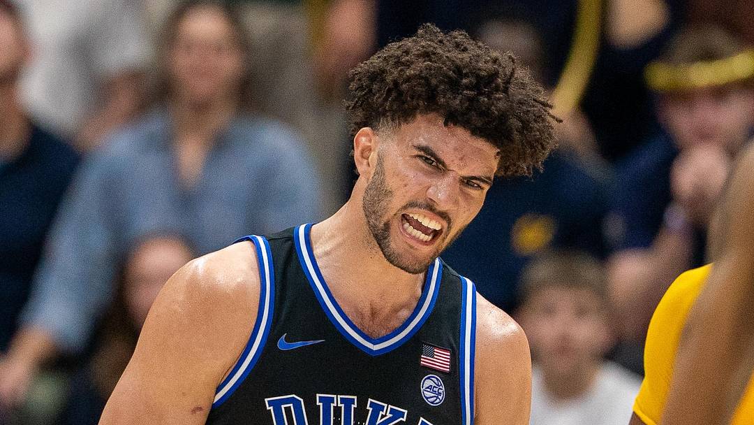 Jan 14, 2026; Berkeley, California, USA; Duke Blue Devils forward Cameron Boozer (12) celebrates after dunking the basketball against the California Golden Bears during the second half at Haas Pavilion. Mandatory Credit: Neville E. Guard-Imagn Images