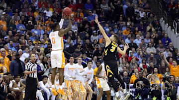 Mar 24, 2019; Columbus, OH, USA; Tennessee Volunteers guard Jordan Bone (0) shoots the ball over Iowa Hawkeyes guard Jordan Bohannon (3) in overtime  in the second round of the 2019 NCAA Tournament at Nationwide Arena. Mandatory Credit: Kevin Jairaj-Imagn Images