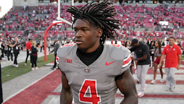 Oct 5, 2024; Columbus, OH, USA; Ohio State Buckeyes wide receiver Jeremiah Smith (4) runs off the field after beating Iowa Hawkeyes after the NCAA football game at Ohio Stadium.
