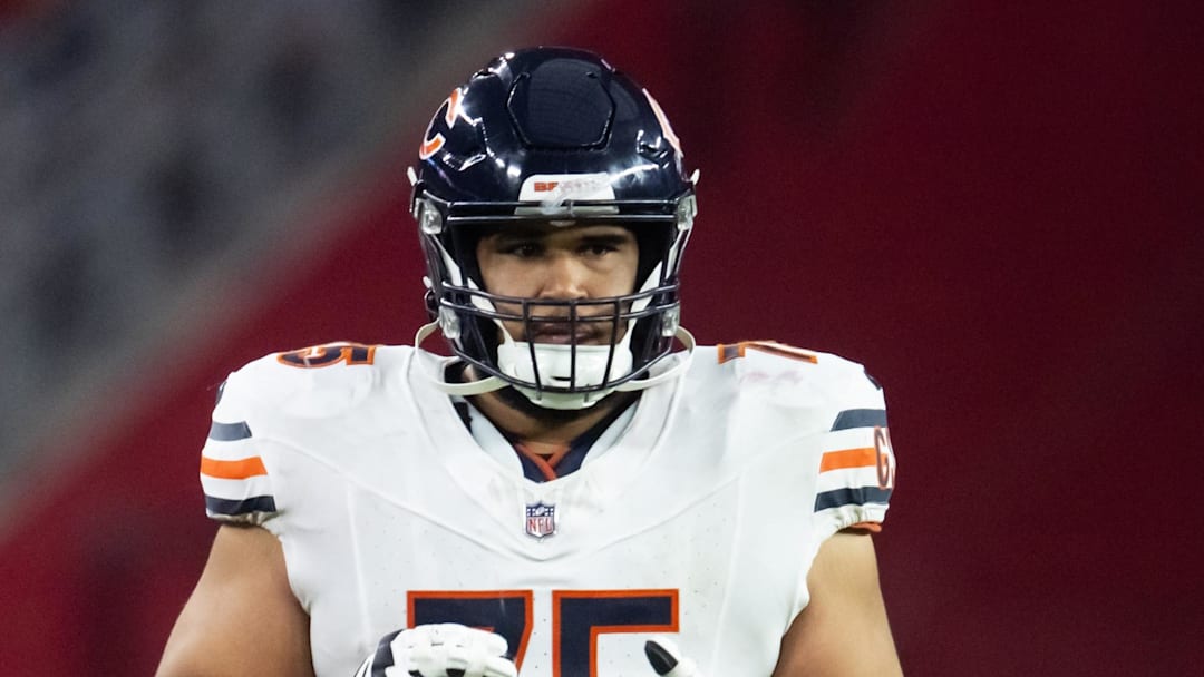 Nov 3, 2024; Glendale, Arizona, USA; Chicago Bears offensive tackle Larry Borom (75) against the Arizona Cardinals at State Farm Stadium. Mandatory Credit: Mark J. Rebilas-Imagn Images