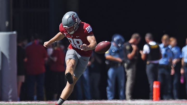 Aug 31, 2024; Pullman, Washington, USA; Washington State Cougars place kicker Ryan Harris (98) kicks the ball away to against the Portland State Vikings in the first half at Gesa Field at Martin Stadium. Mandatory Credit: James Snook-USA TODAY Sports