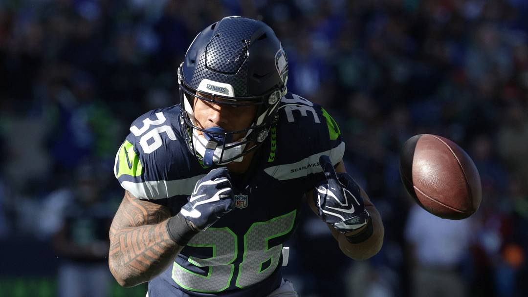 Oct 11, 2026; Seattle, Washington, USA;  Seattle Seahawks running back George Holani (36) fumbles the ball while running against the San Francisco 49ers during the first half at Lumen Field.  Mandatory Credit: Joe Nicholson-Imagn Images