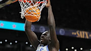 Apr 5, 2025; San Antonio, TX, USA; Duke Blue Devils center Khaman Maluach (9) dunks against the Houston Cougars in the semifinals of the men's Final Four of the 2025 NCAA Tournament at the Alamodome. Mandatory Credit: Robert Deutsch-Imagn Images