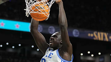 Apr 5, 2025; San Antonio, TX, USA; Duke Blue Devils center Khaman Maluach (9) dunks against the Houston Cougars in the semifinals of the men's Final Four of the 2025 NCAA Tournament at the Alamodome. Mandatory Credit: Robert Deutsch-Imagn Images
