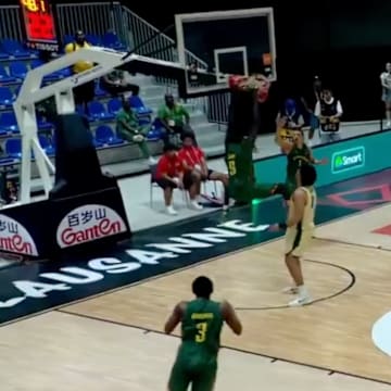 Cameroon player dunks on wrong hoop. 