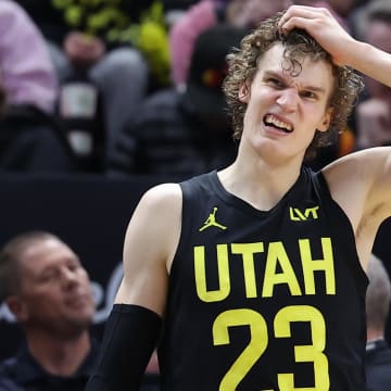 Mar 27, 2024; Salt Lake City, Utah, USA; Utah Jazz forward Lauri Markkanen (23) reacts to a play against the San Antonio Spurs during the fourth quarter at Delta Center. Mandatory Credit: