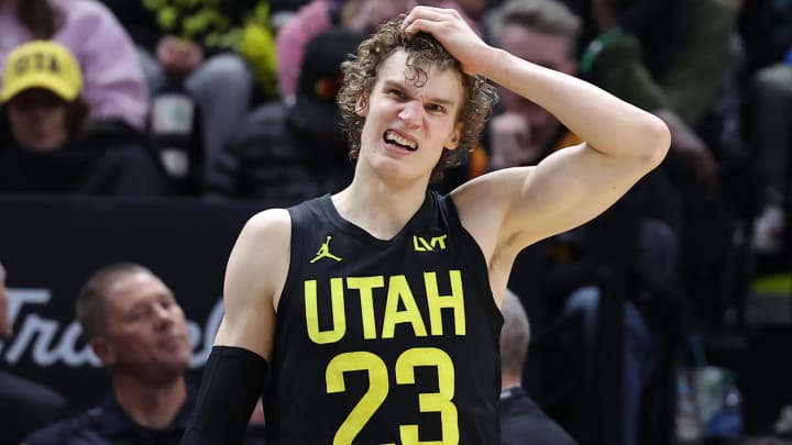 Mar 27, 2024; Salt Lake City, Utah, USA; Utah Jazz forward Lauri Markkanen (23) reacts to a play against the San Antonio Spurs during the fourth quarter at Delta Center. Mandatory Credit: