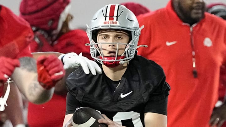 Ohio State Buckeyes quarterback Julian Sayin (10) takes a snap during spring football practice at the Woody Hayes Athletic Center on March 17, 2025. Ohio State Buckeyes quarterback Julian Sayin (10) takes a snap during spring football practice at the Woody Hayes Athletic Center on March 17, 2025.