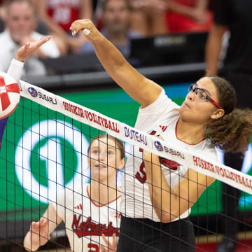 Nebraska volleyball middle blocker Rebekah Allick attacks against TCU.