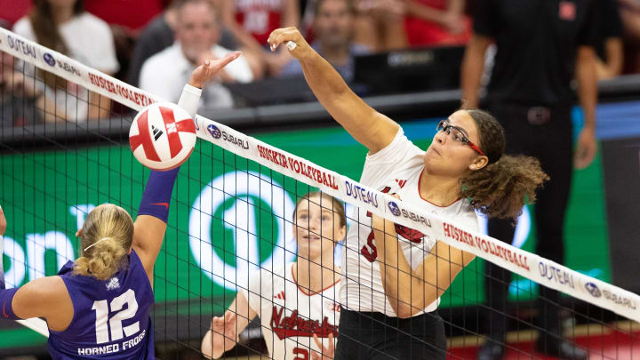 Nebraska volleyball middle blocker Rebekah Allick attacks against TCU.