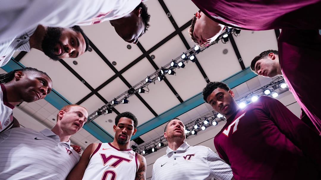 Virginia Tech basketball team in a huddle pregame vs Saint Mary's.