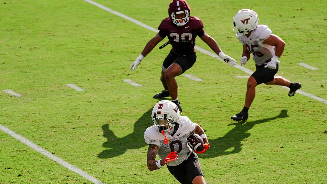 BLACKSBURG, Va. — Ayden Greene runs after the catch in a fall-camp scrimmage set. BLACKSBURG, Va. — Ayden Greene runs after the catch in a fall-camp scrimmage set.