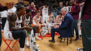 Mike Young addressing the team during a timeout. Credit - Virginia Tech Athletics