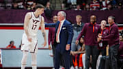 Mike Young talks to Neo Avdalas during Virginia Tech season opener. Credit - Virginia Tech Athletics