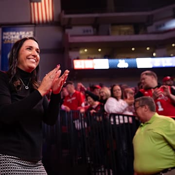 Nebraska women's basketball coach Amy Williams enters Pinnacle Bank Arena for a game against Creighton.