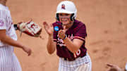 Jordan Lynch claps after reaching base against the Alabama Crimson Tide.