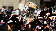 Nov 30, 2024; Blacksburg, VA; USA; Virginia Tech hoisting the Commonwealth Cup After 37-17 W over Virginia