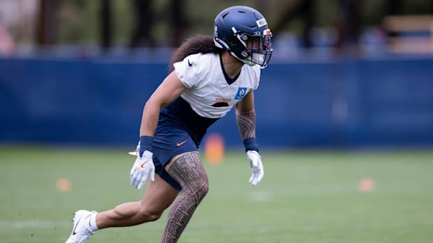 Denver Broncos safety Talanoa Hufanga (9) practices during OTAs at Broncos Park Powered by CommonSpirit. 