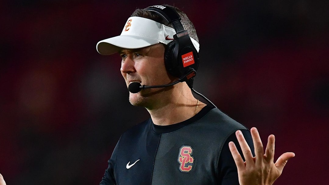 Sep 20, 2025; Los Angeles, California, USA; Southern California Trojans head coach Lincoln Riley watches game action against the Michigan State Spartans during the second half at the Los Angeles Memorial Coliseum. Mandatory Credit: Gary A. Vasquez-Imagn Images