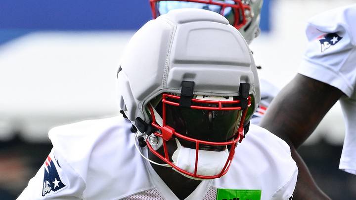 Jul 28, 2026; Foxborough, MA, USA; New England Patriots wide receiver A.J. Brown (1) works with a member of the coaching staff during training camp at Gillette Stadium. Mandatory Credit: Eric Canha-Imagn Images