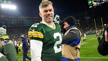 Former Green Bay Packers place kicker Mason Crosby (2) is all smiles after kicking the game-winning field goal at Lambeau Field.
