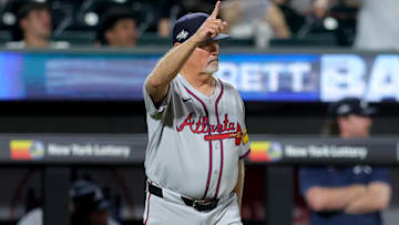 Jun 24, 2025; New York City, New York, USA; Atlanta Braves manager Brian Snitker (43) makes a pitching change during the ninth inning against the New York Mets at Citi Field. Mandatory Credit: Brad Penner-Imagn Images