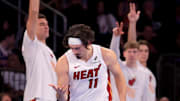 Nov 14, 2025; New York, New York, USA; Miami Heat forward Jaime Jaquez Jr. (11) celebrates his three point shot against the New York Knicks during the second quarter at Madison Square Garden. Mandatory Credit: Brad Penner-Imagn Images