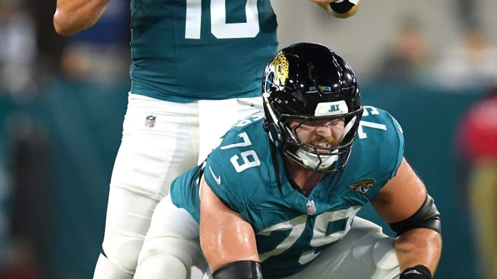 Jacksonville Jaguars quarterback Mac Jones (10) gives instructions to the offensive line while lined up behind center Luke Fortner (79) during early second quarter action. The Jacksonville Jaguars hosted the Tampa Bay Buccaneers at EverBank Stadium for the Jaguars second preseason game of the season Saturday, August 17, 2024. 