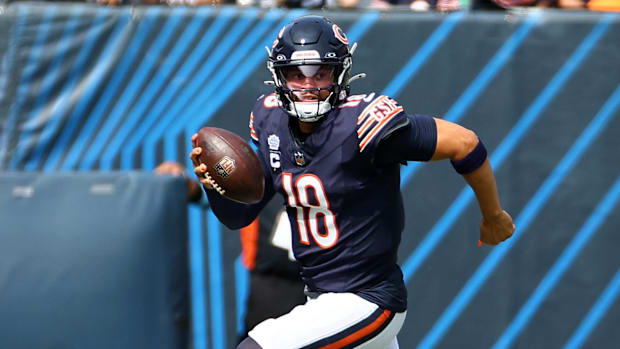 Chicago Bears quarterback Caleb Williams (18) rushes the ball