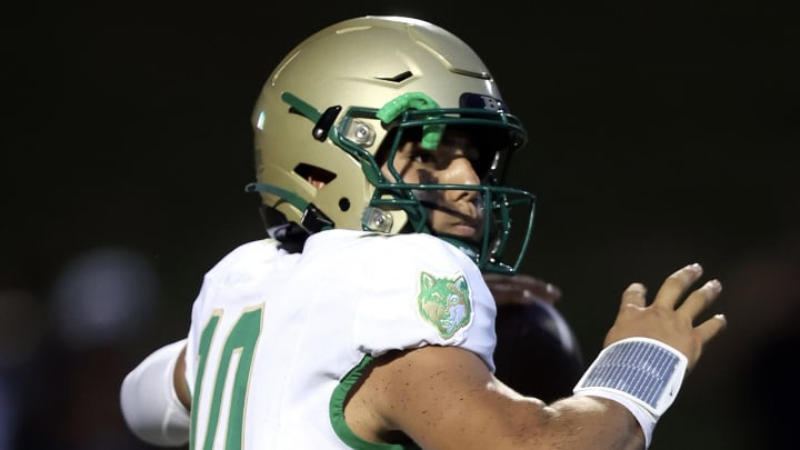 Dayton Raiola made his debut as starting Buford (Georgia) High School quarterback Friday, Aug. 16, against Milton. | David McGregor, SBLive