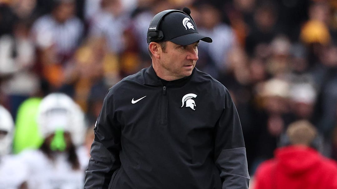 Nov 1, 2025; Minneapolis, Minnesota, USA; Michigan State Spartans head coach Jonathan Smith looks on during the first half against the Minnesota Golden Gophers at Huntington Bank Stadium. Mandatory Credit: Matt Krohn-Imagn Images