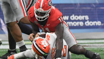 Aug 31, 2024; Atlanta, Georgia, USA; Georgia Bulldogs linebacker Jalon Walker (11) sacks Clemson Tigers quarterback Cade Klubnik (2) during the fourth quarter of the 2024 Aflac Kickoff Game at Mercedes-Benz Stadium